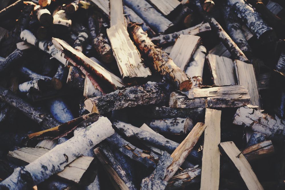 A stacked pile of wood, showcasing the work of a specialized junk removal service based in San Jose, CA.